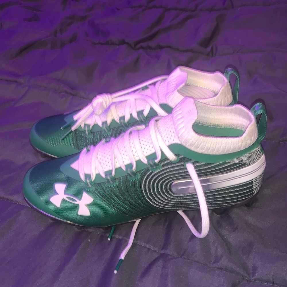 Size 9 Green and white Under Armor spotlight cleats